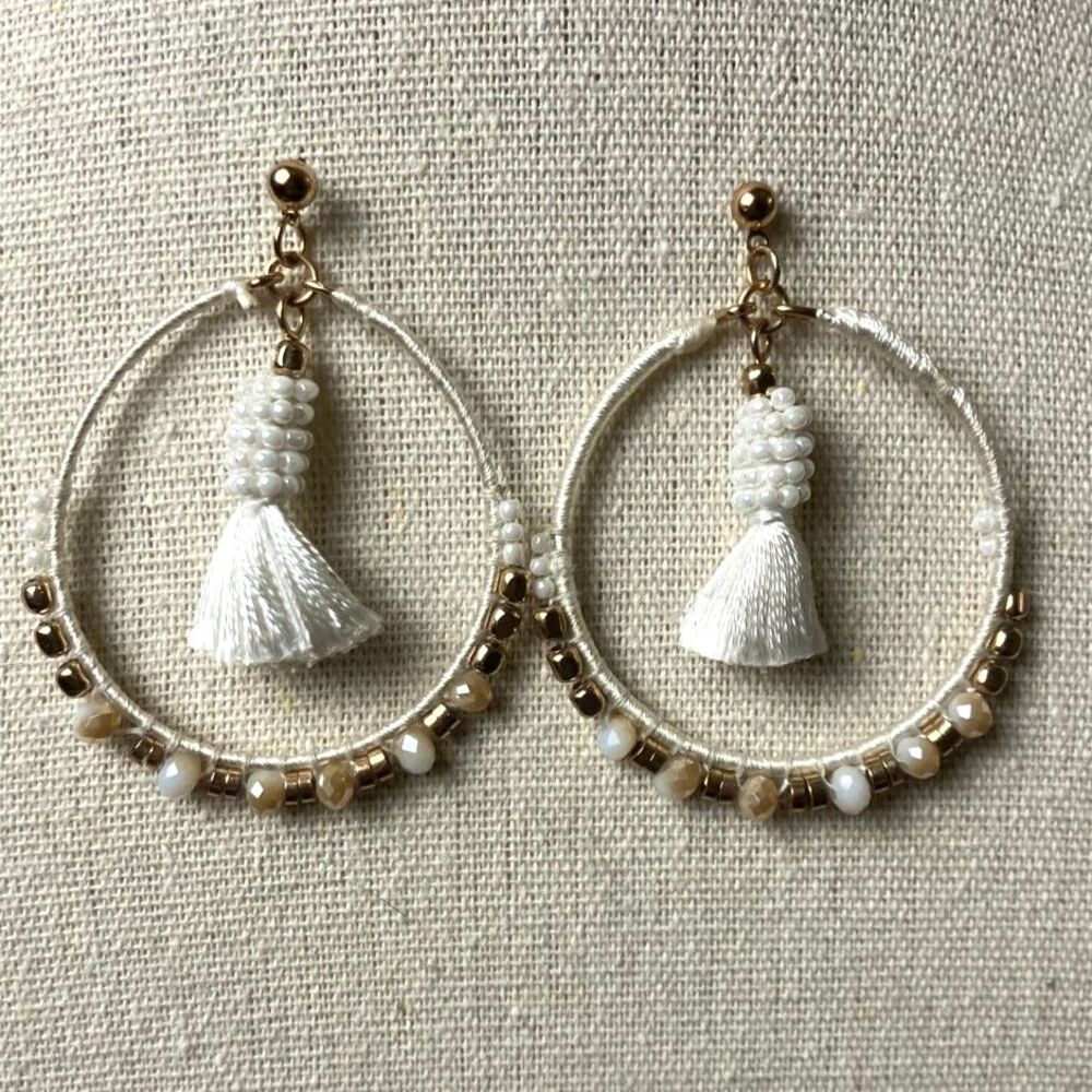 Beaded hoop earrings with tassels